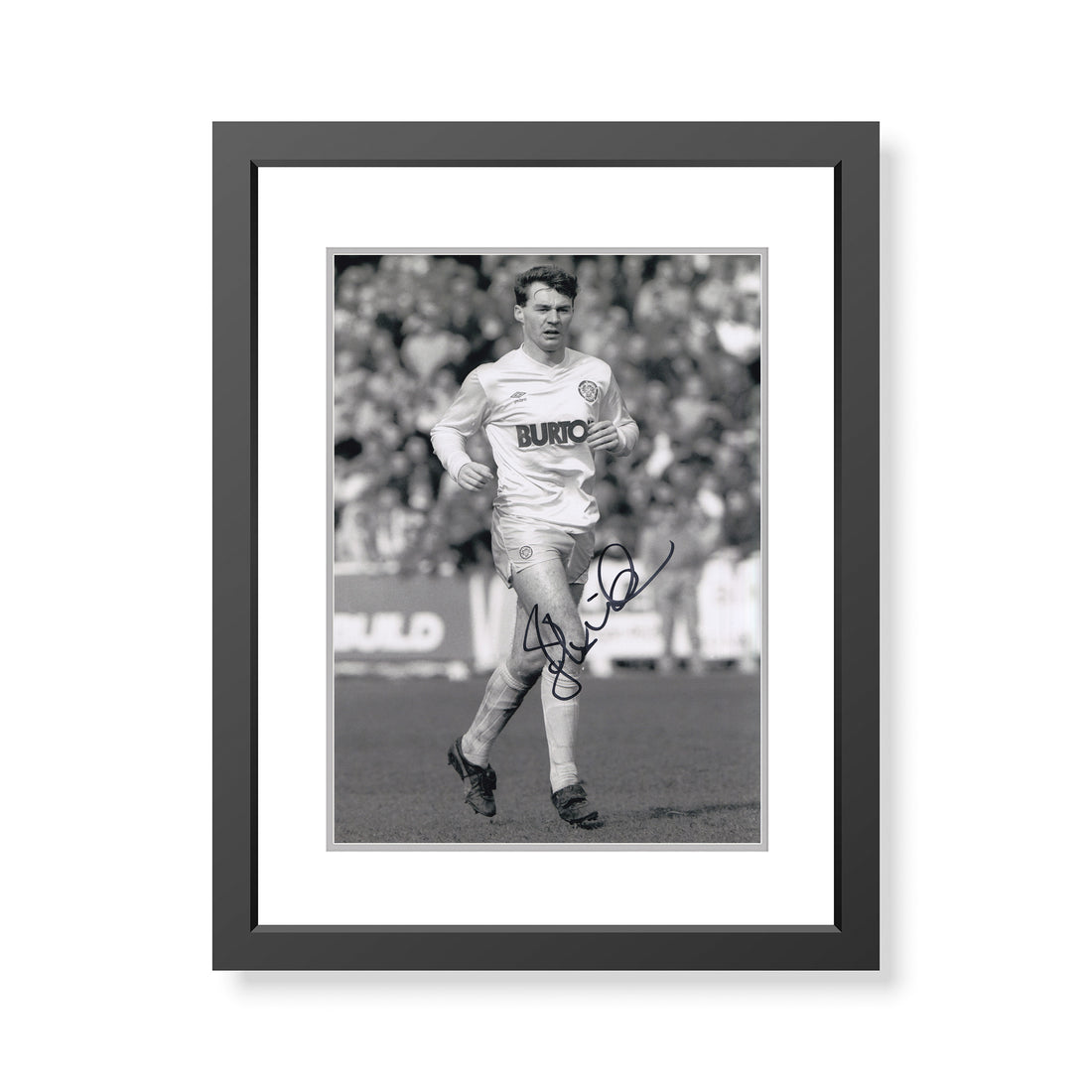 This is a stunning photograph signed by Leeds United legend John Sheridan.