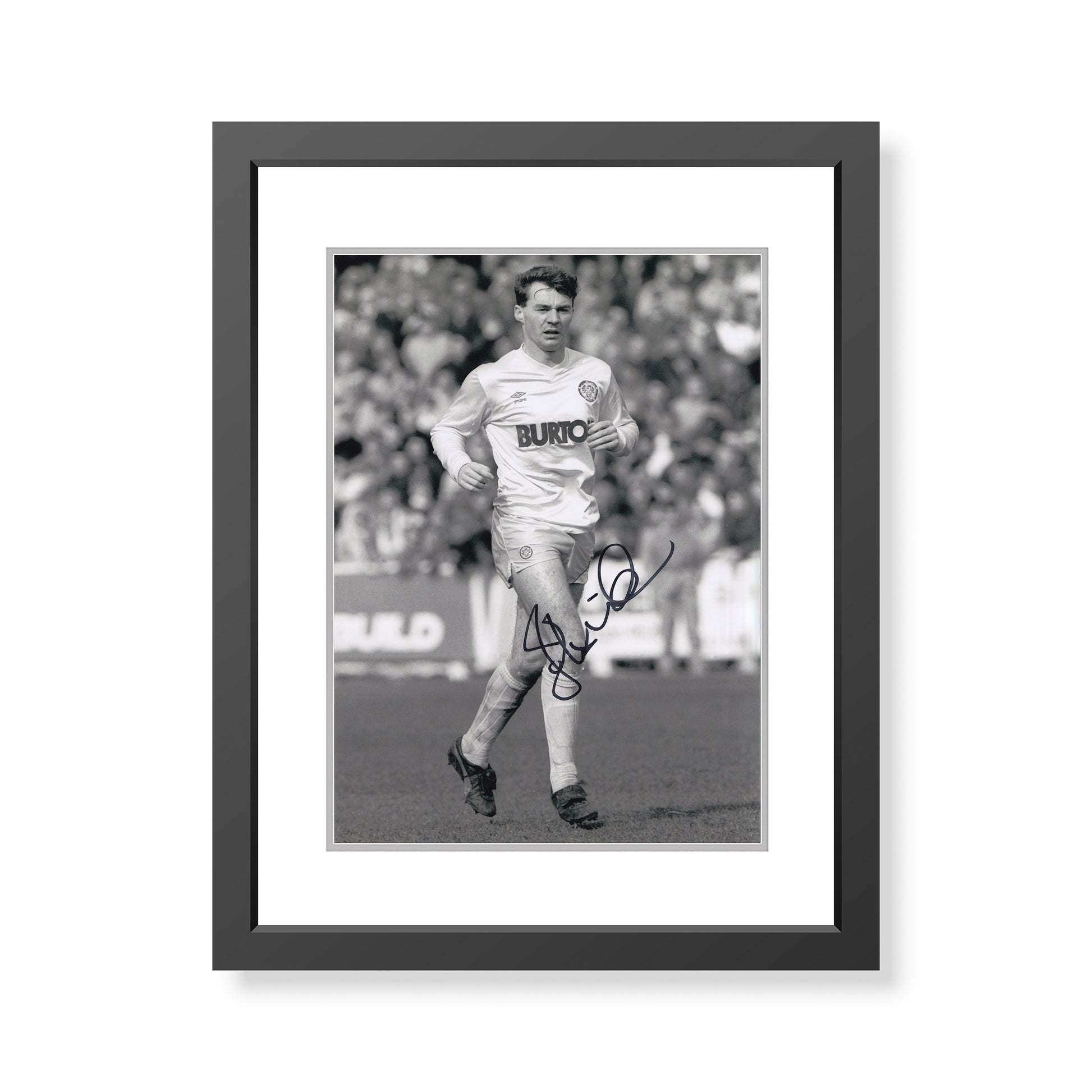 This is a stunning photograph signed by Leeds United legend John Sheridan.