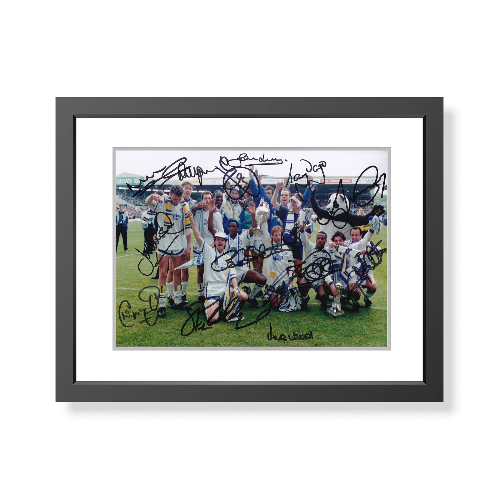 This is a stunning 12x8 framed photograph signed by Leeds United's 1992 championship winning squad.