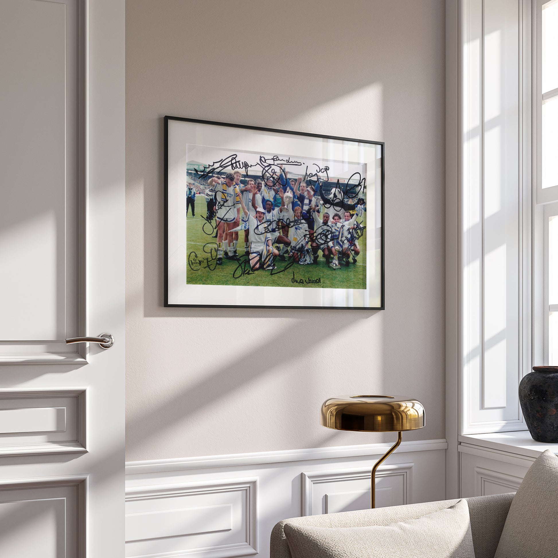 This is a stunning 12x8 framed photograph signed by Leeds United's 1992 championship winning squad.