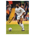 This is a stunning photograph signed by Leeds United legend Lucas Radebe.